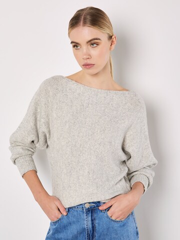 Pull-over 'Batwing' Apricot en gris