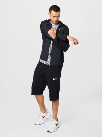 NIKE Sports sweat jacket in Black