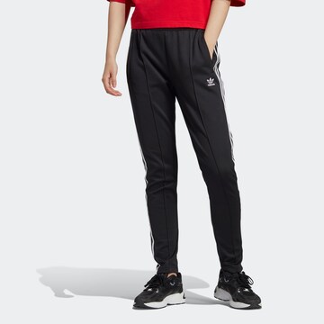 Coupe slim Pantalon ADIDAS ORIGINALS en noir : devant