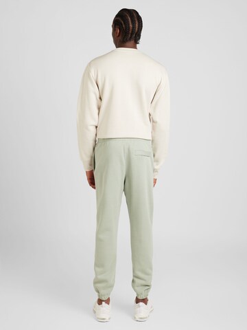 Nike Sportswear Tapered Παντελόνι 'Club Fleece' σε πράσινο