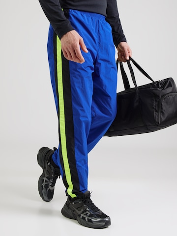 UNDER ARMOUR Конический (Tapered) Спортивные штаны в Синий: спереди