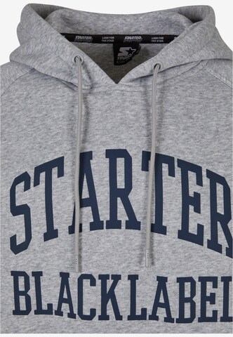 Starter Black Label Collegepaita 'Raglan' värissä harmaa