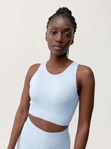 Born Living Yoga Bustier Sporttop 'Amal' in Blauw: voorkant