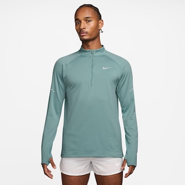 NIKE Performance Shirt 'WINTRZD STRIDE' in Blue: front