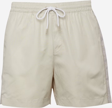 Shorts de bain Calvin Klein Swimwear en beige : devant
