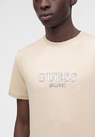 Maglietta di GUESS in beige