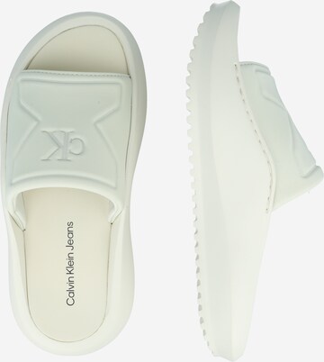 Calvin Klein JeansNatikače s potpeticom - bež boja