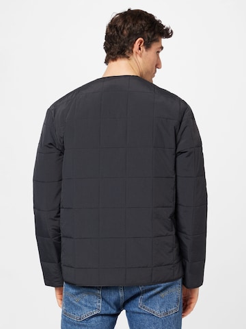 ADIDAS ORIGINALS Between-season jacket 'Adventure Fc Quilted Liner' in Black