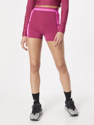 NIKE - Slimfit Pantalón deportivo en rosa: frente