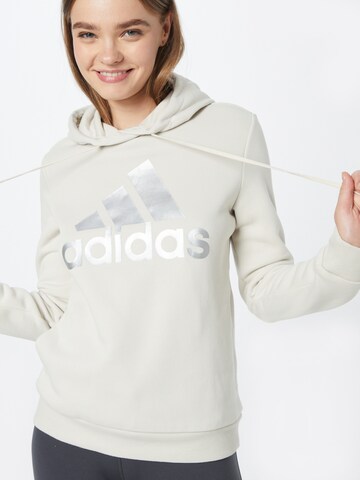 ADIDAS SPORTSWEAR Спортен суитшърт с качулка 'Essentials Logo Fleece' в бежово