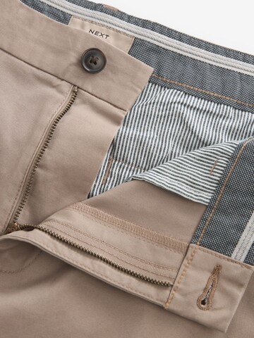 Next Slimfit Chinobyxa i beige