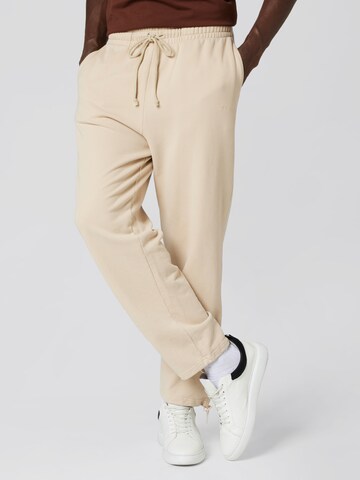 Sinned x ABOUT YOU Loose fit Trousers 'Milo' in Beige: front