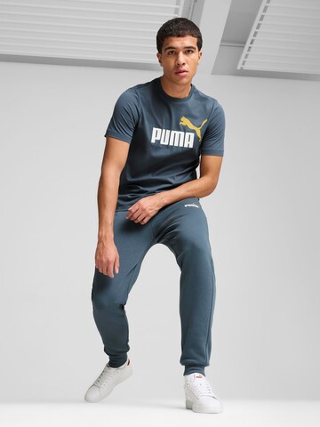 Effilé Pantalon de sport 'ESS+' PUMA en bleu