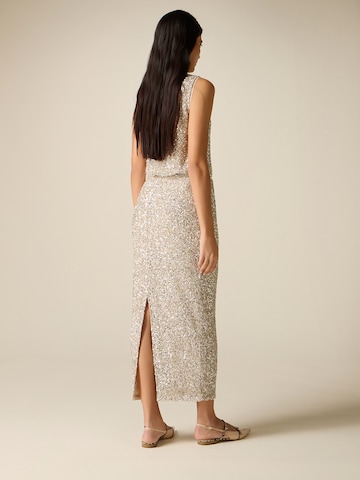 Gonna di oltre in oro