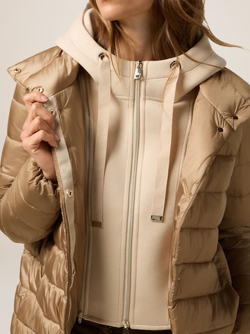 Giacca invernale di oltre in beige