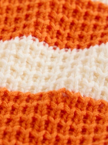 Cardigan Next en orange