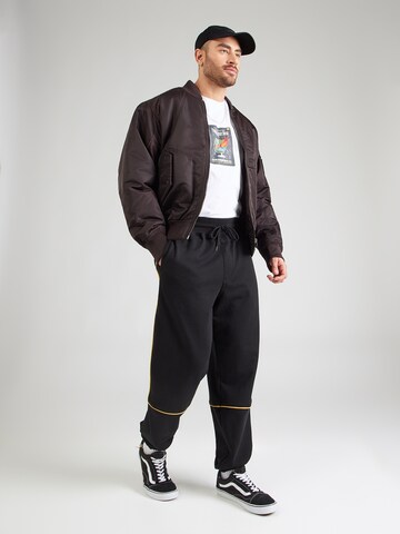 VANS Alt kitsenev Püksid 'Star V', värv must