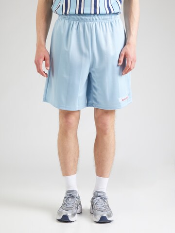 Karl Kani Regular Trousers in Blue: front