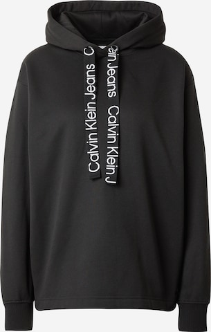 Sweat-shirt Calvin Klein Jeans en noir : devant