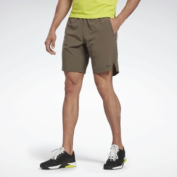 Reebok Sport Workout Pants in Green: front