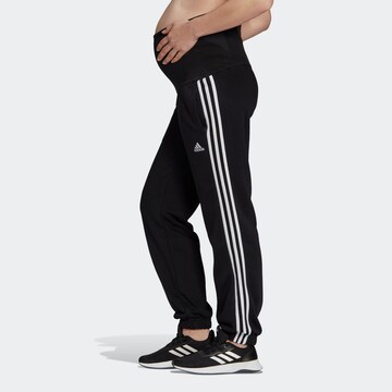 ADIDAS SPORTSWEAR Zwężany krój Spodnie sportowe 'Essentials  3-Stripes ' w kolorze czarny