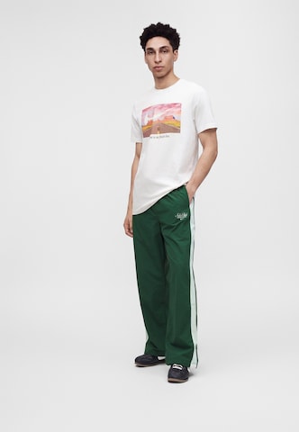 Nike Sportswear Loosefit Nadrág 'Club' - zöld