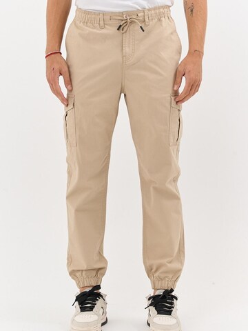 comeor Regular Cargo Pants in Beige: front