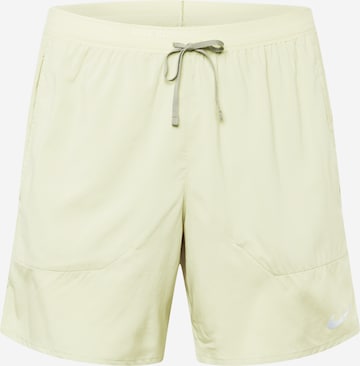 Pantalon de sport 'STRIDE' NIKE en vert : devant