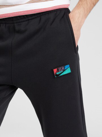 Nike Sportswear Tapered Παντελόνι 'CLUB' σε μαύρο