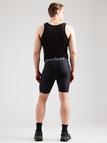 Skinny Pantalon de sport UNDER ARMOUR en noir