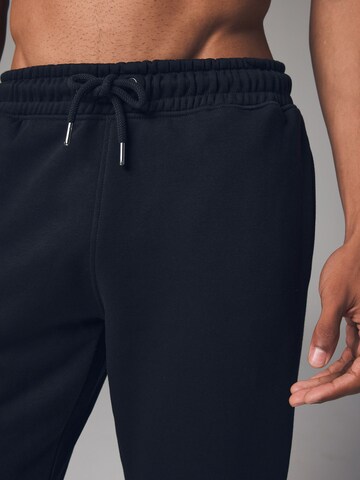 Tapered Pantaloni di Next in nero