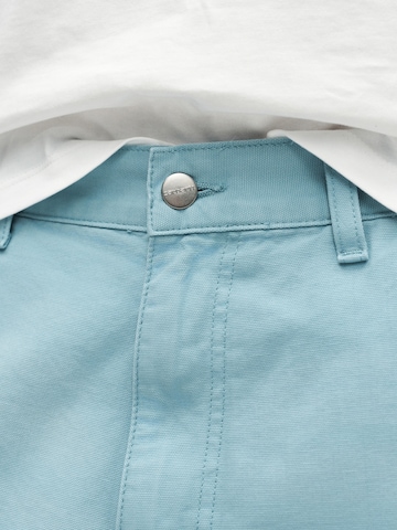 Carhartt WIP Lużny krój Spodnie 'Brandon' w kolorze niebieski