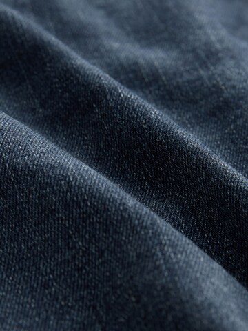 Coupe slim Jean 'Motion Flex' Next en bleu