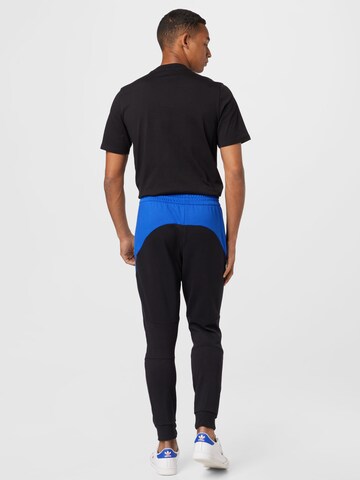 ADIDAS SPORTSWEAR Tapered Hose in Blau