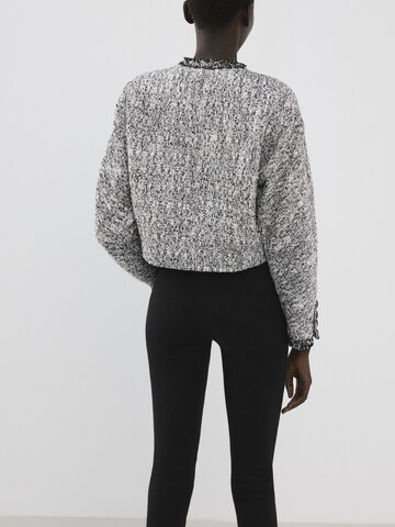 MANGO Välikausitakki 'Ditor' värissä musta