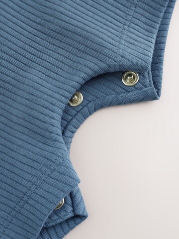 Next Strampler in Blau