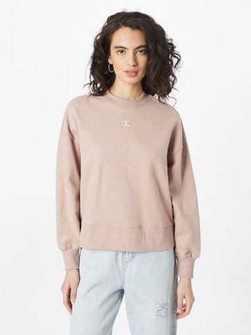 Bluză de molton de la Calvin Klein Jeans pe bej: față