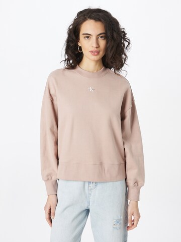 Sweat-shirt Calvin Klein Jeans en beige : devant