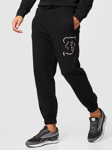 FUBU Tapered Pants 'Tribal' in Black: front