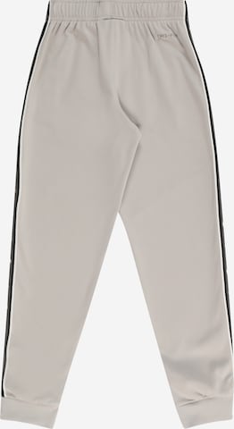 Nike Sportswear Tapered Trousers in Grey