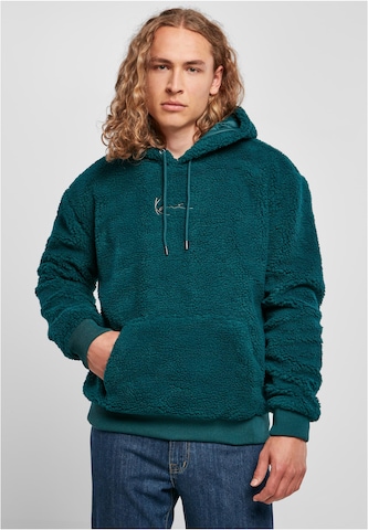 Karl Kani Sweatshirt in Green: front