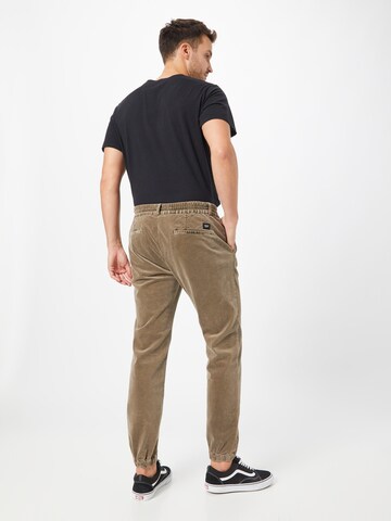 REPLAY Tapered Pleat-front trousers in Brown