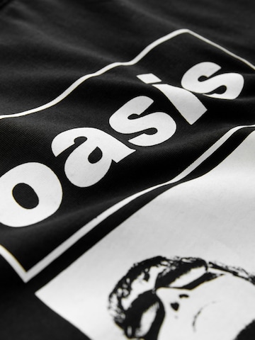 Next Paita 'Oasis' värissä musta