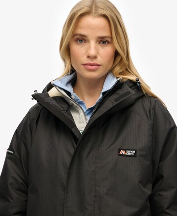 Superdry Tussenmantel in Zwart