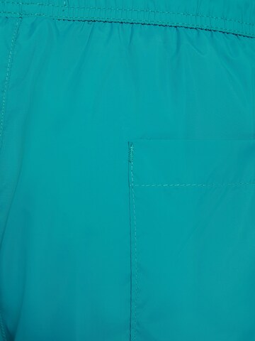 Bershka Plavecké šortky – modrá