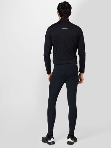 Skinny Pantalon de sport 'Accelerate' new balance en noir