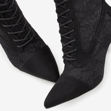 LASCANA Lace-up bootie in Black