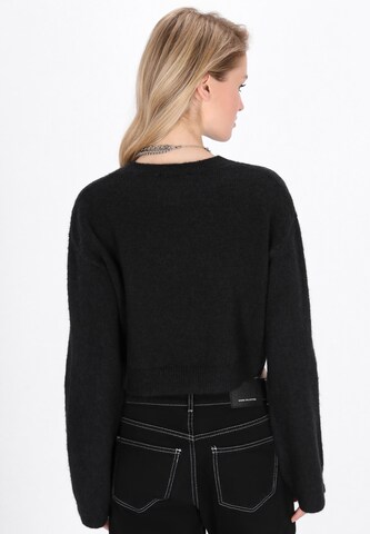 juoda myMo ROCKS Megztinis