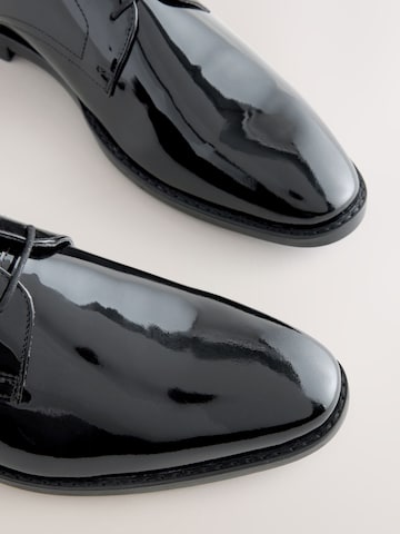 Chaussure à lacets Next en noir