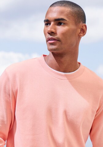 JOHN DEVIN Sweatshirt in Orange